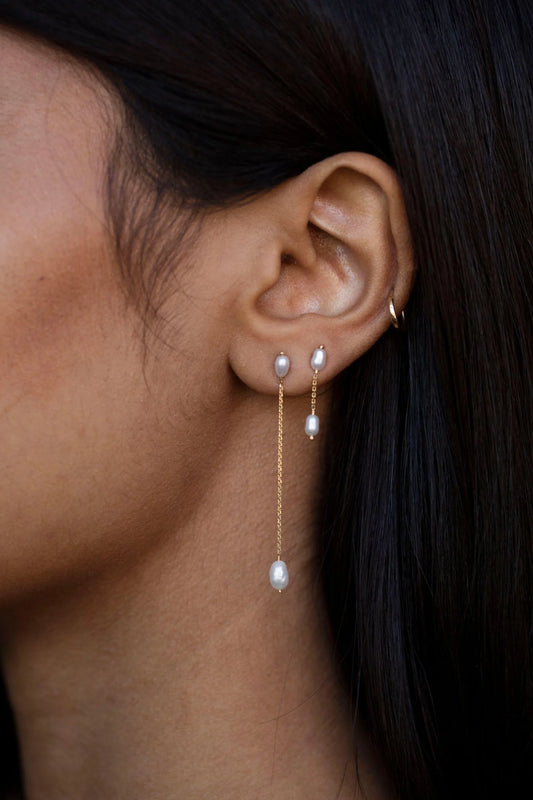 wwake / long pearl shower earring - single