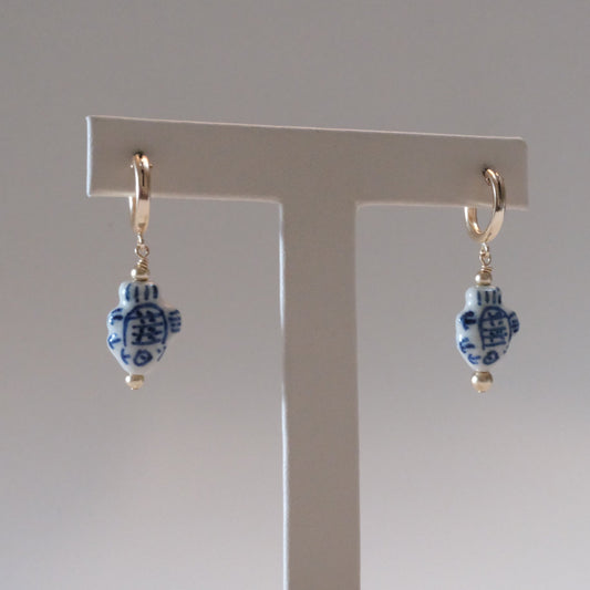 shannon len / ceramic fish tiny tube hoop earrings