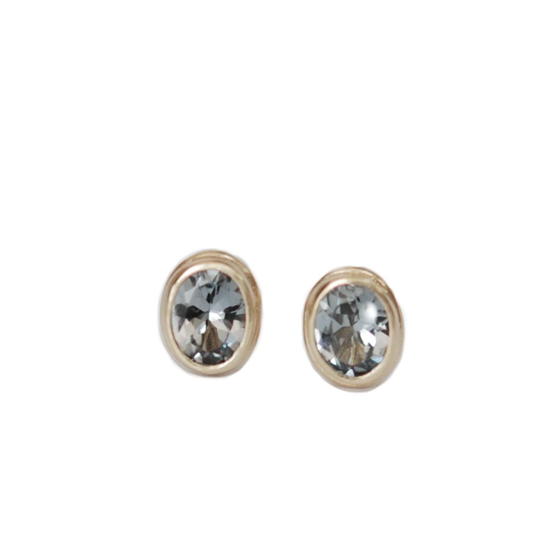 steely blue spinel oval stud earrings