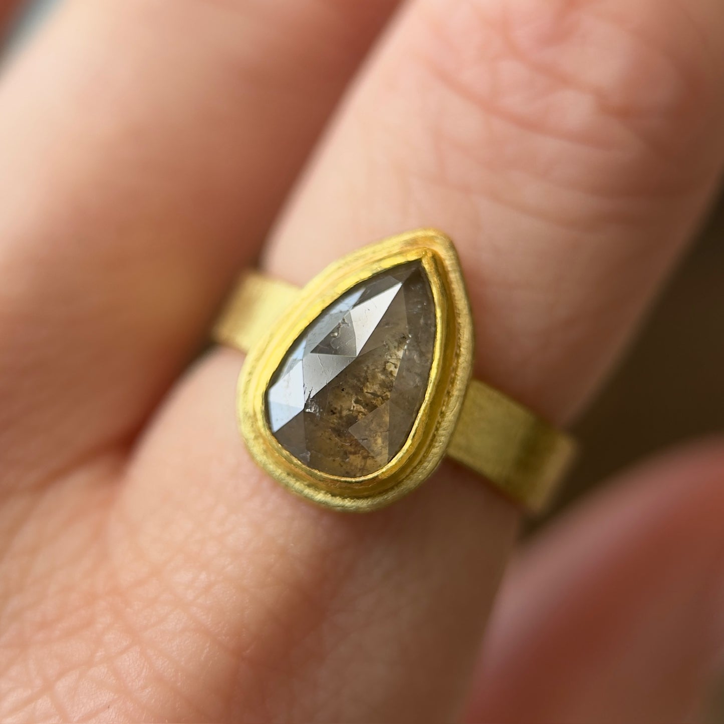 rose-cut brown diamond teardrop framed ring
