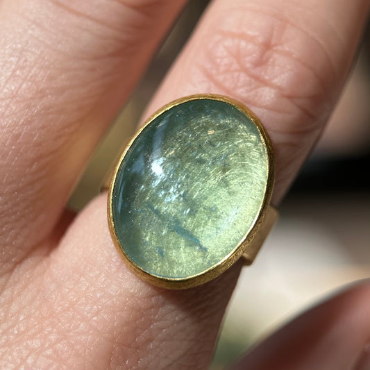 aquamarine low-dome cabochon oval ring
