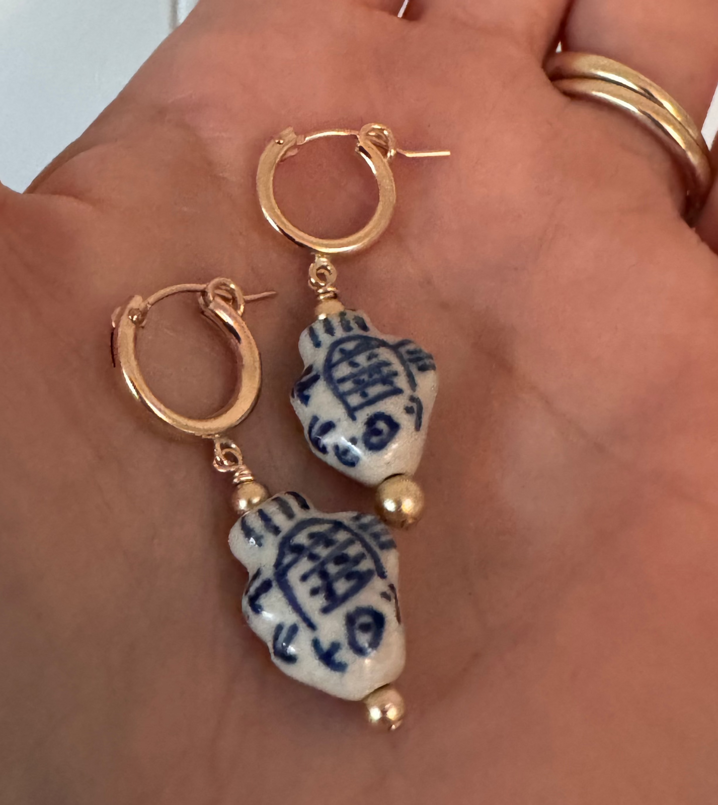 shannon len / ceramic fish tiny tube hoop earrings