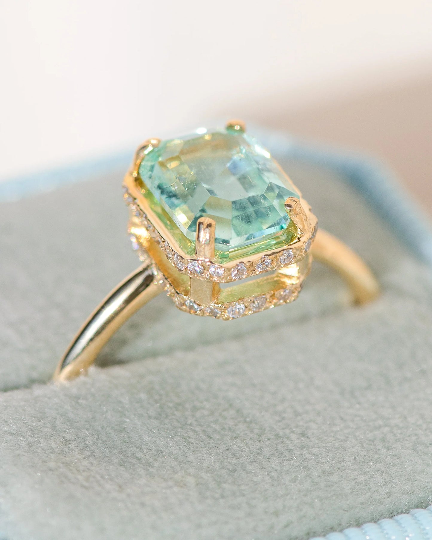 hidden halo ring - nigerian emerald