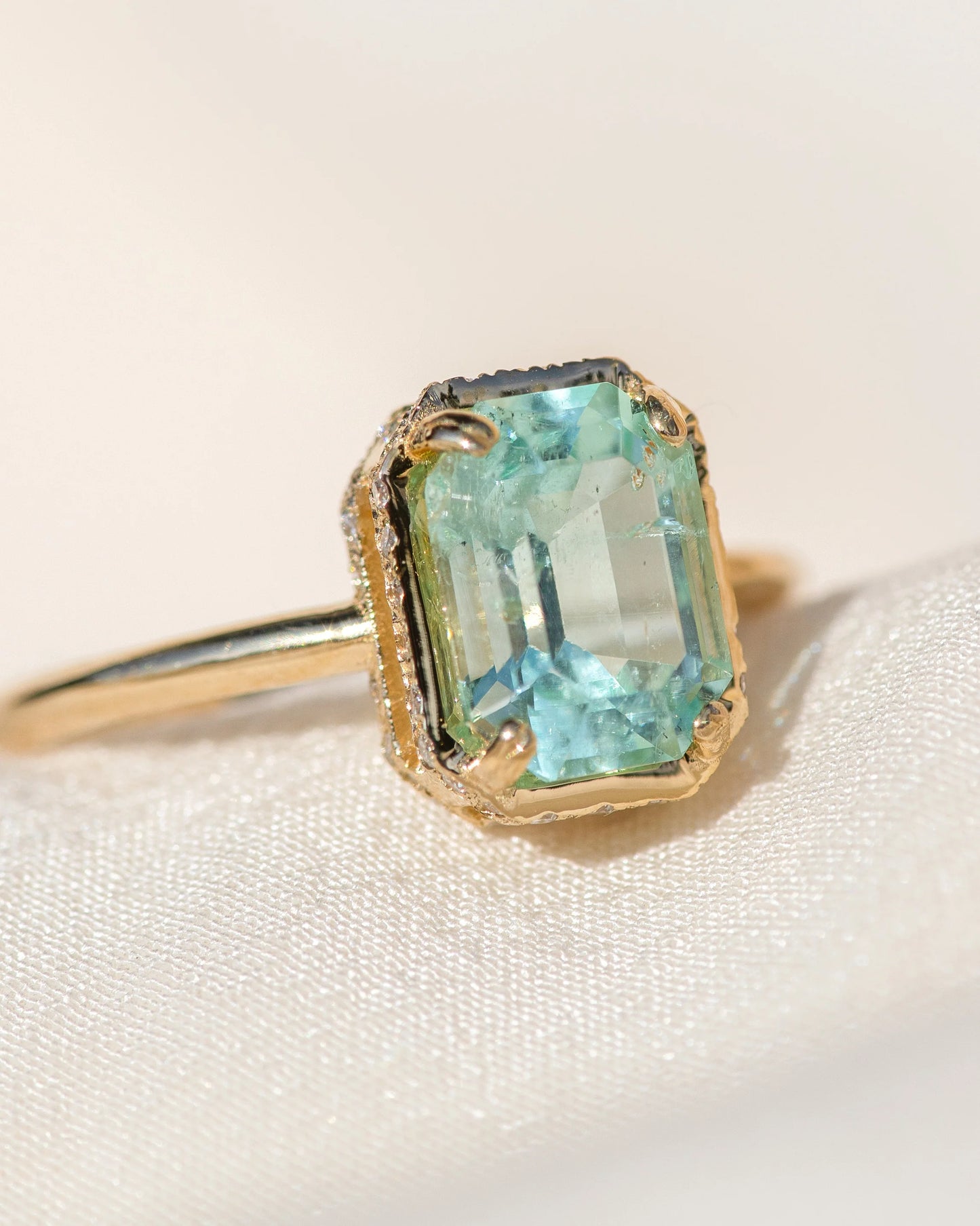hidden halo ring - nigerian emerald