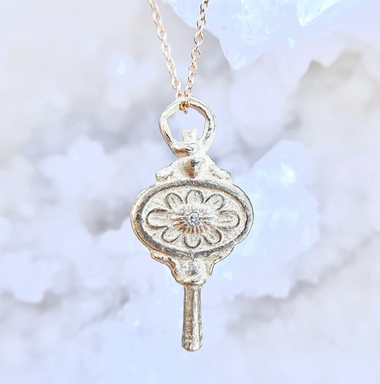 'small key' artifact necklace