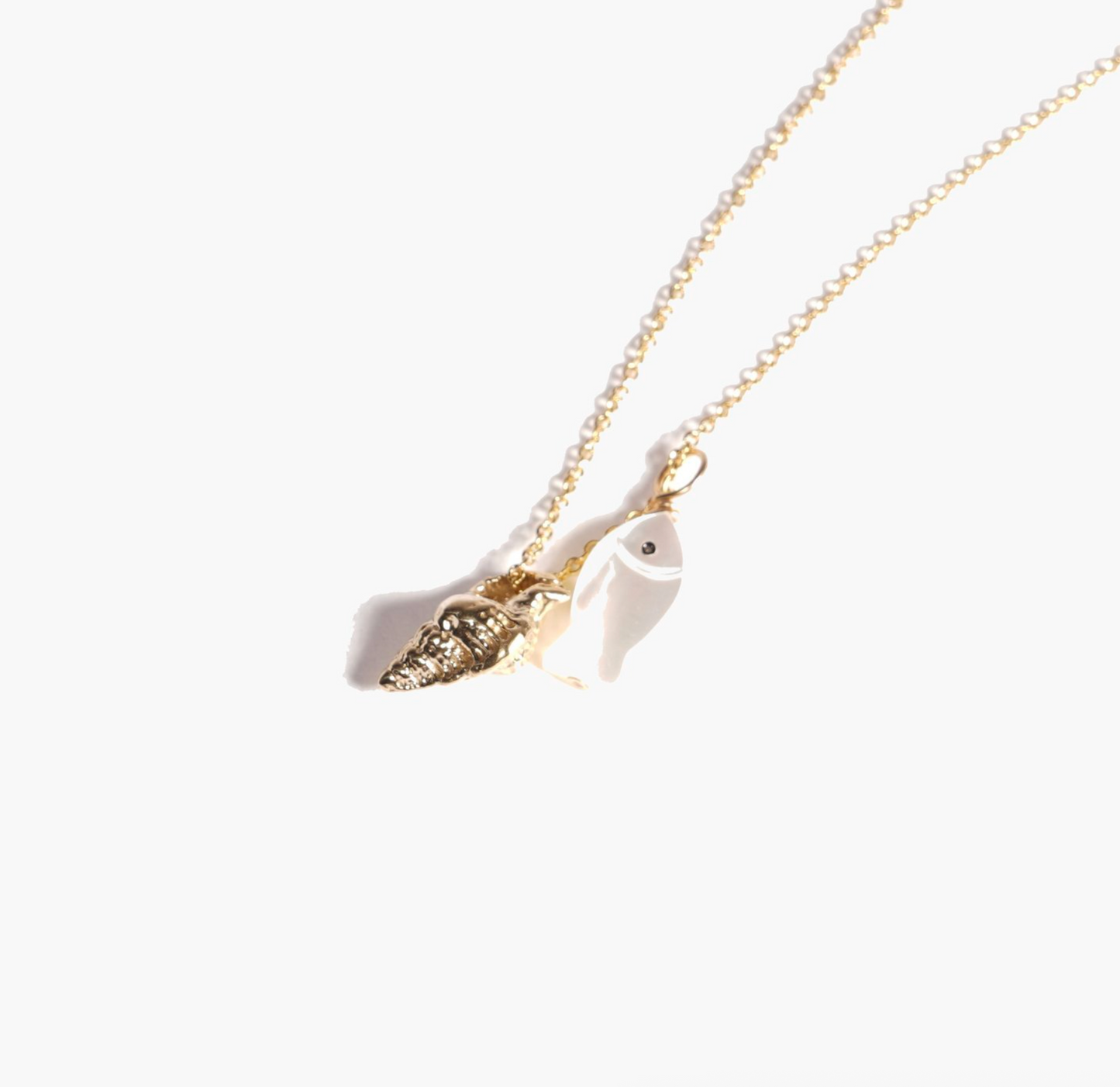 coquille fish charm necklace