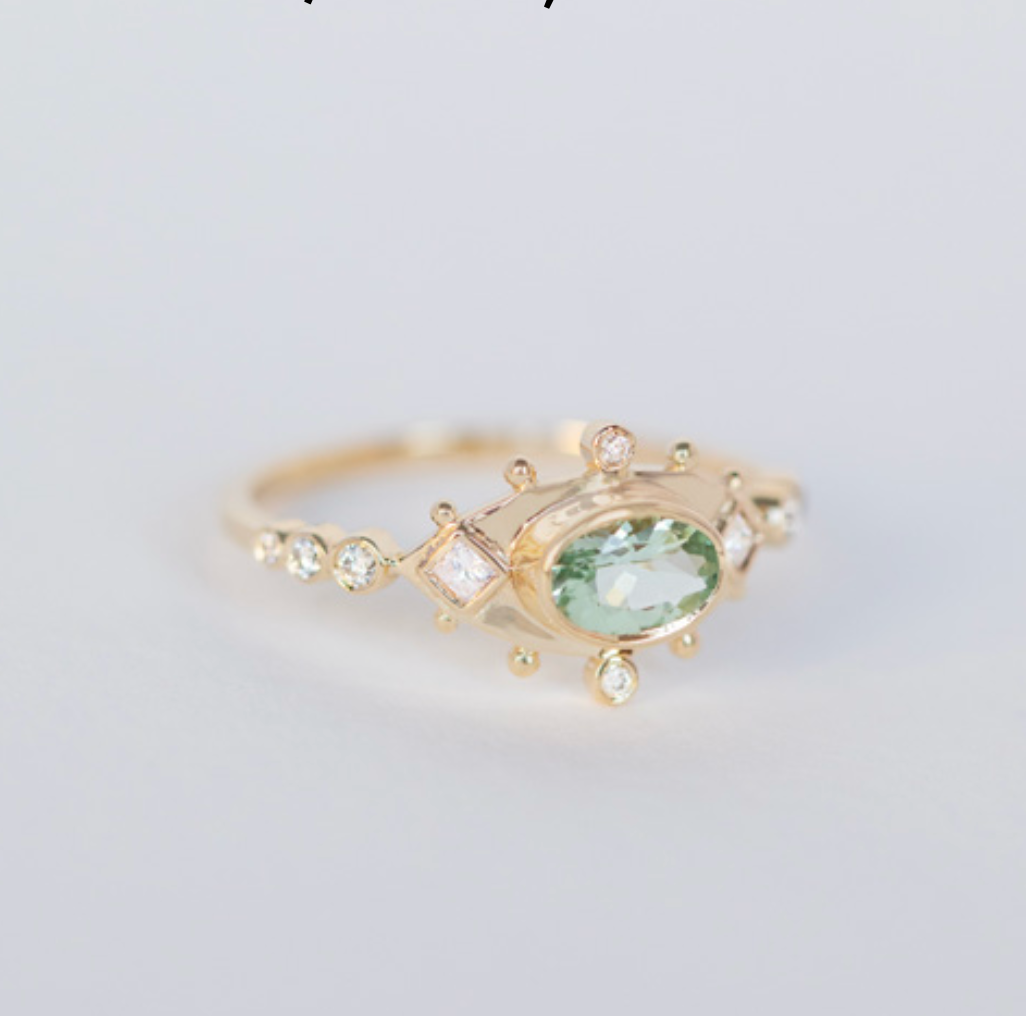 light green tourmaline & diamond eye ring