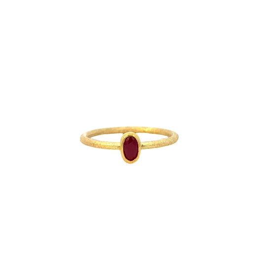 faceted oval ruby ring