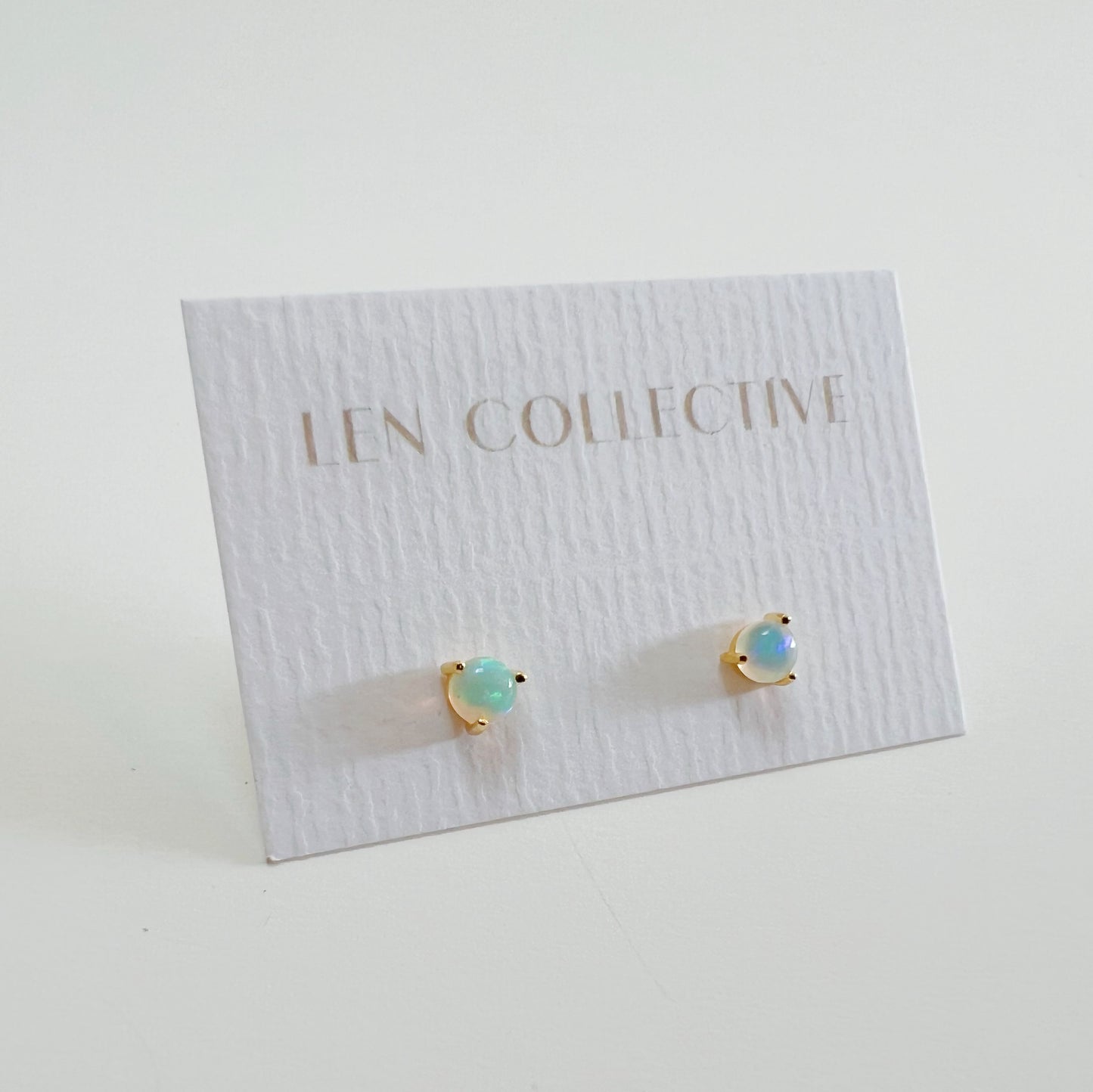 prong-set opal studs