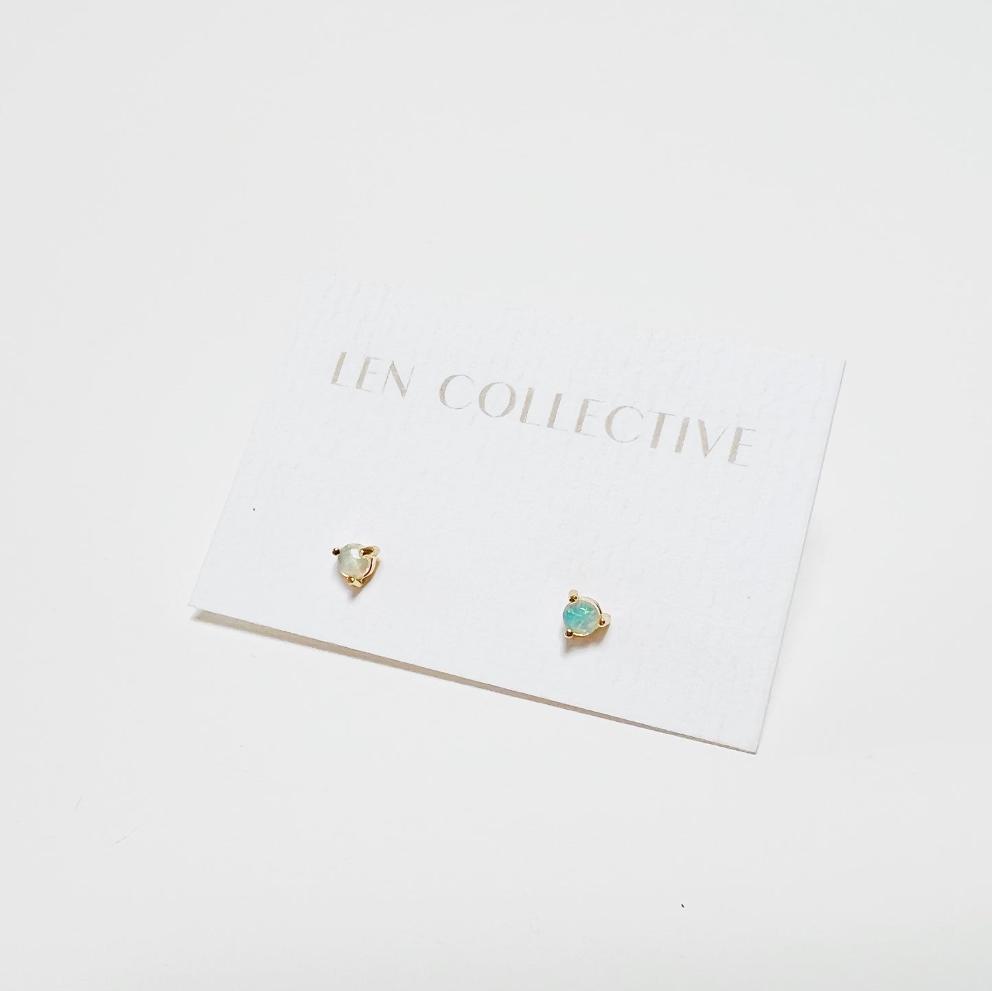 tiny prong stone stud earrings - opal