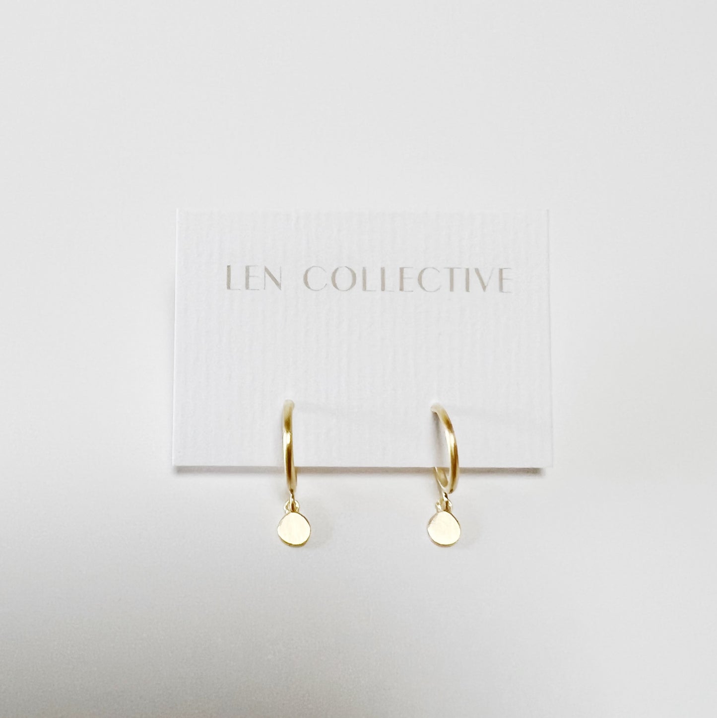 dangling disc post hoop earrings