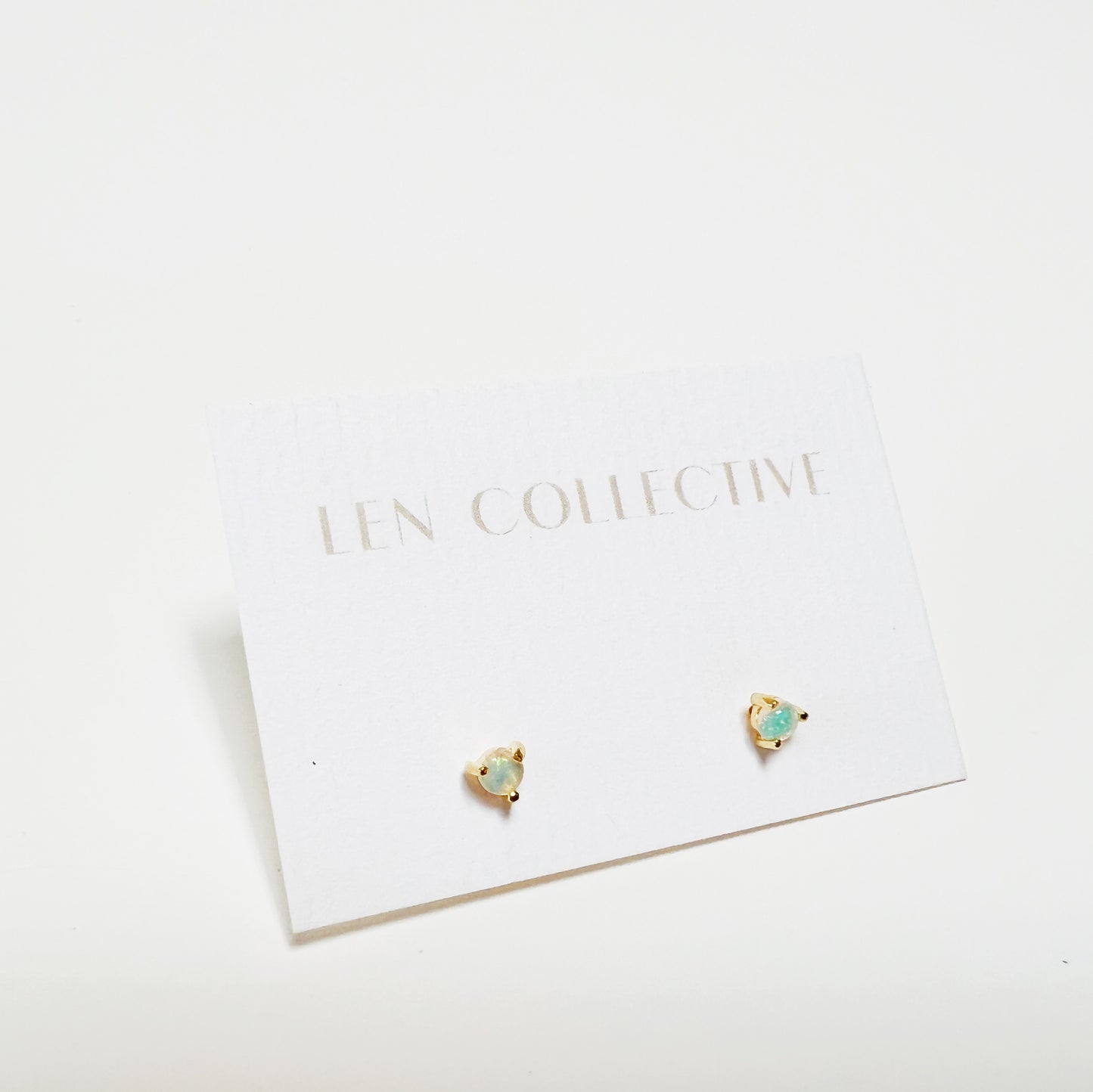 tiny prong stone stud earrings - opal