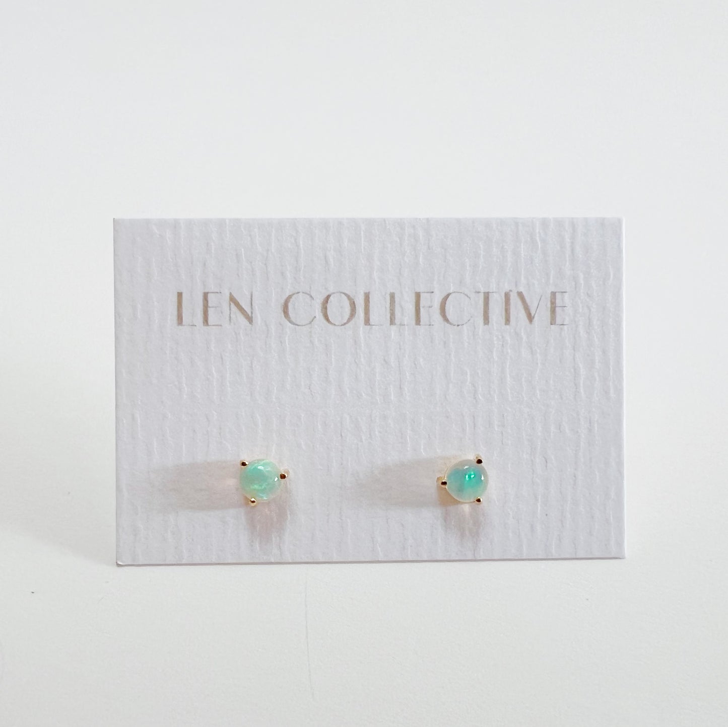 prong-set opal studs