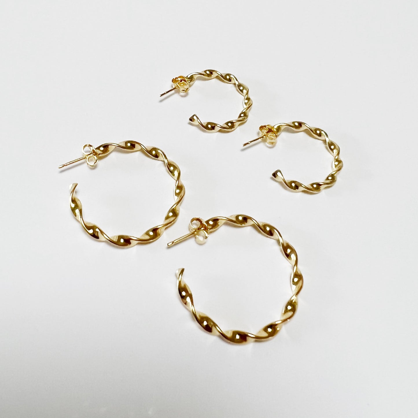 twirled post hoop earrings - medium
