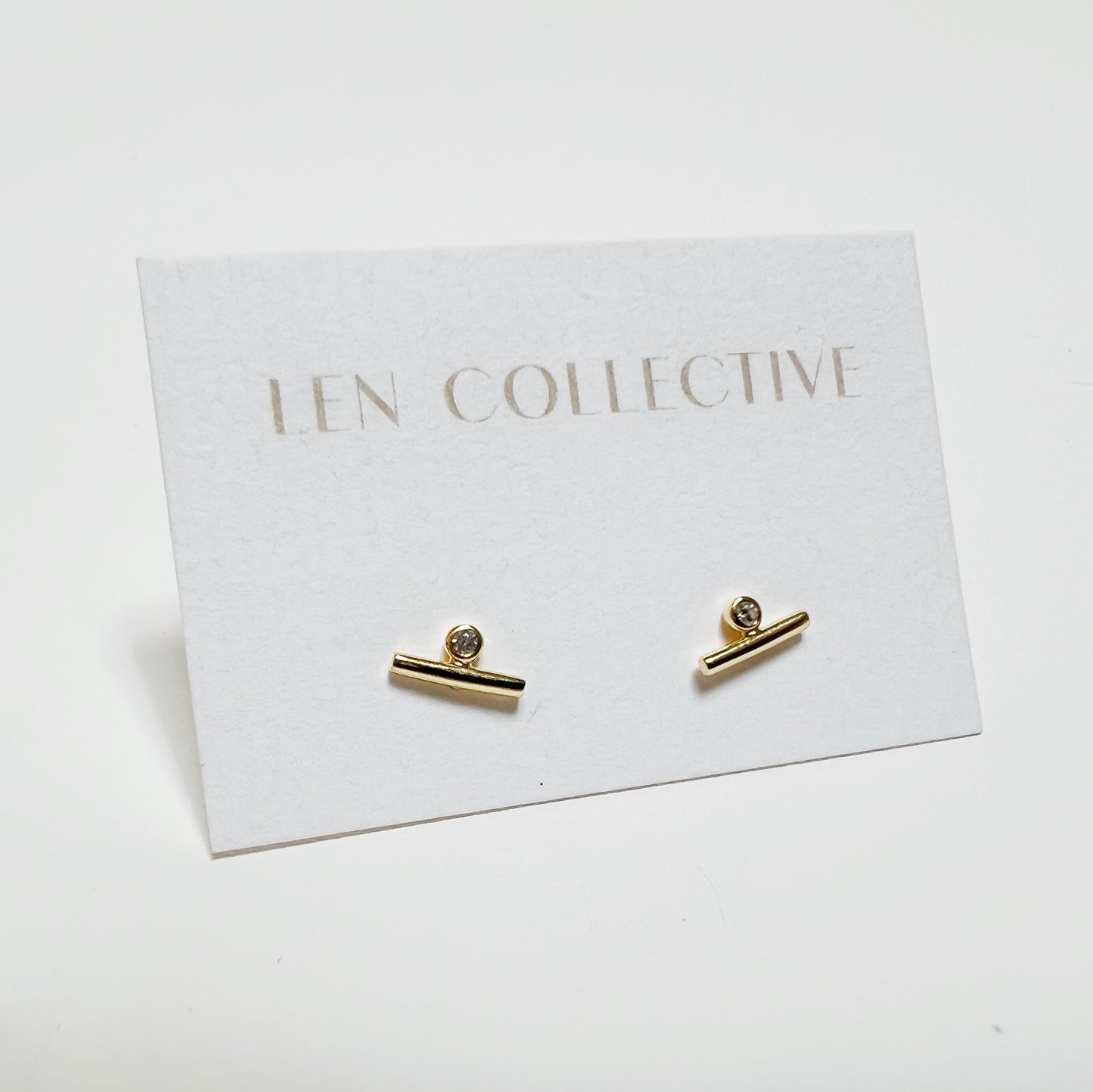 tiny bar + side stone stud earrings - cz