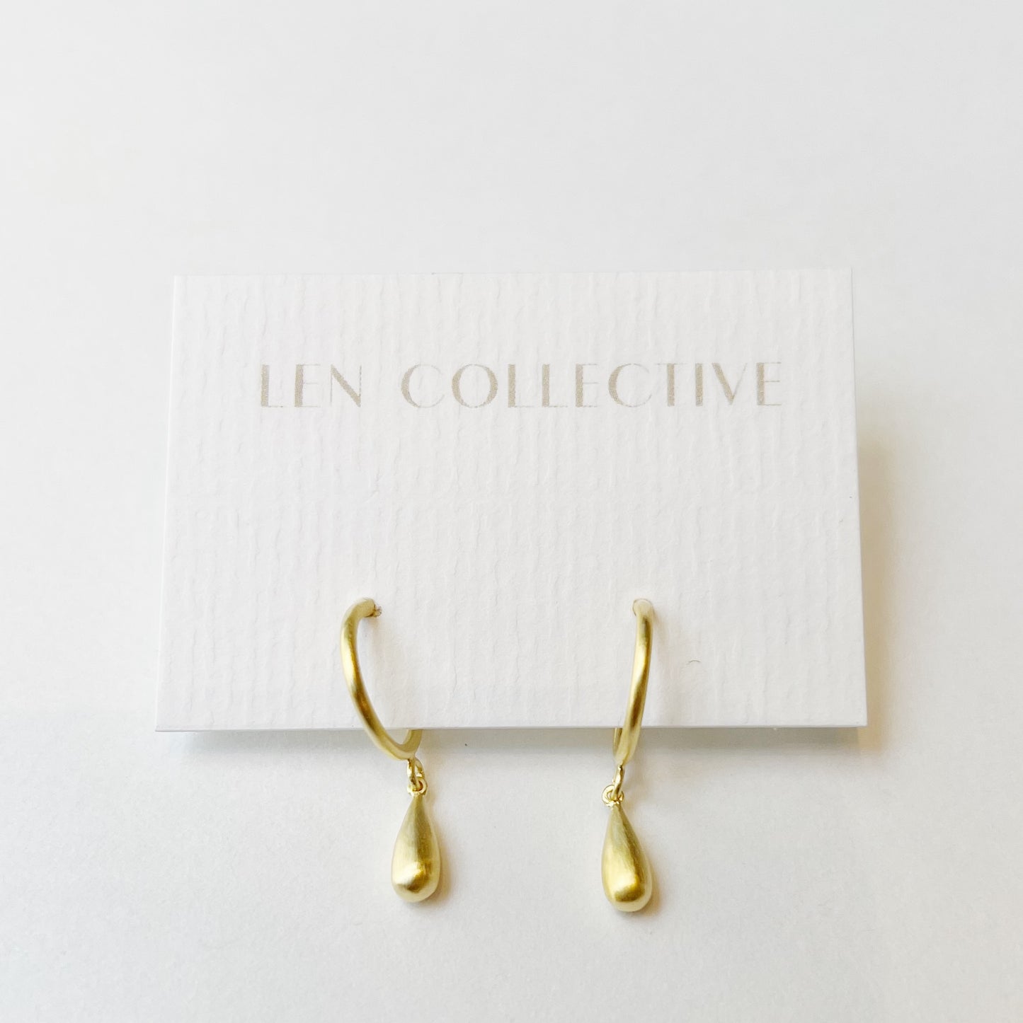 dangling teardrop post hoop earrings