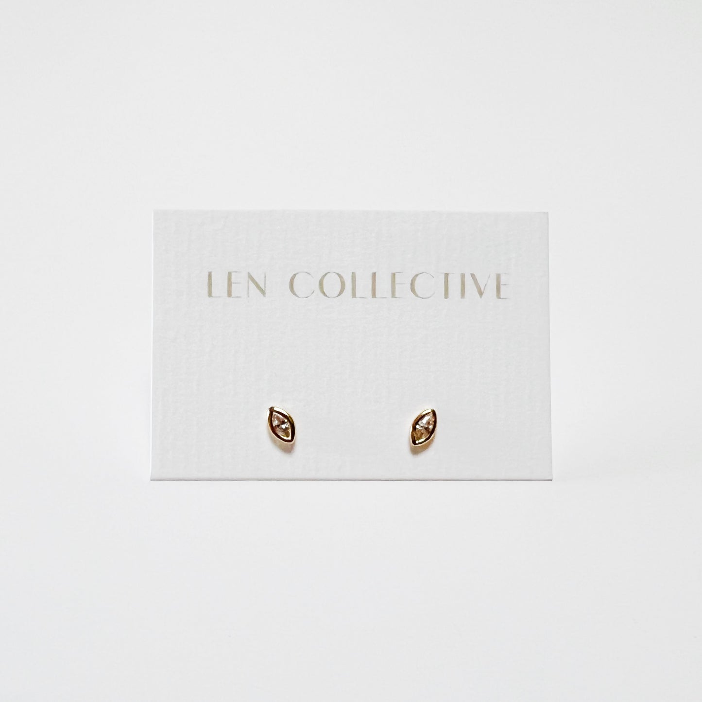 marquise bezel stone stud earrings - cz