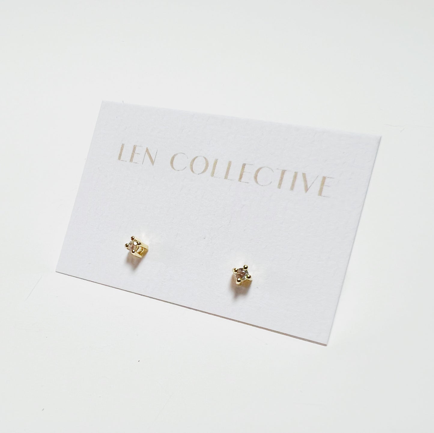 tiny prong stone stud earrings - cz