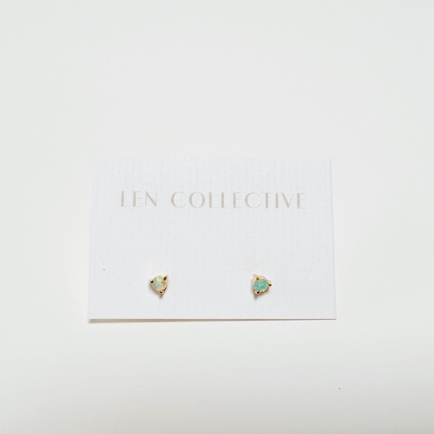 tiny prong stone stud earrings - opal