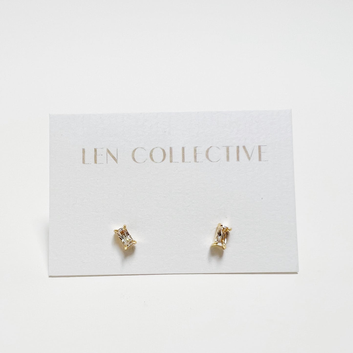 tiny baguette prong stone stud earrings - cz