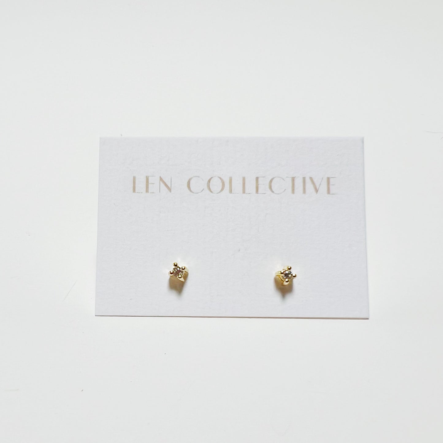 tiny prong stone stud earrings - cz
