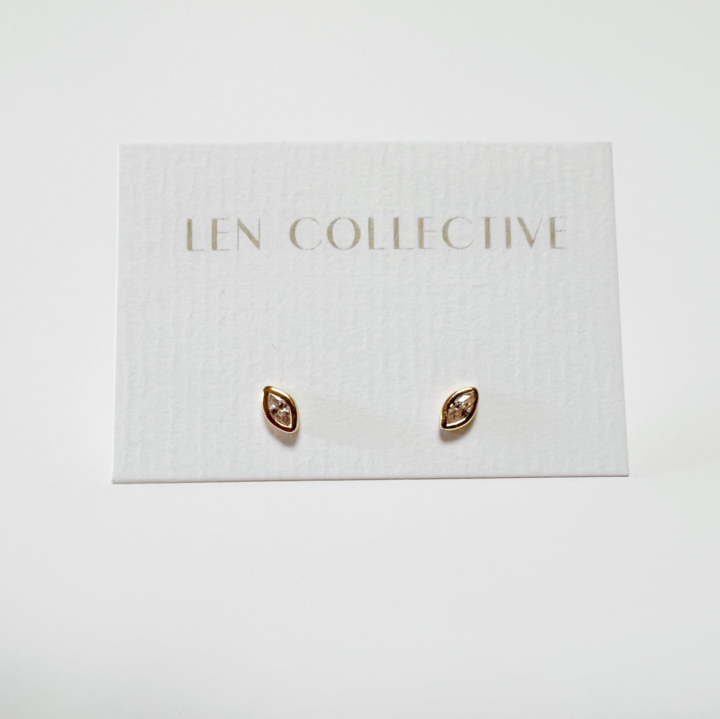 marquise bezel stone stud earrings - cz