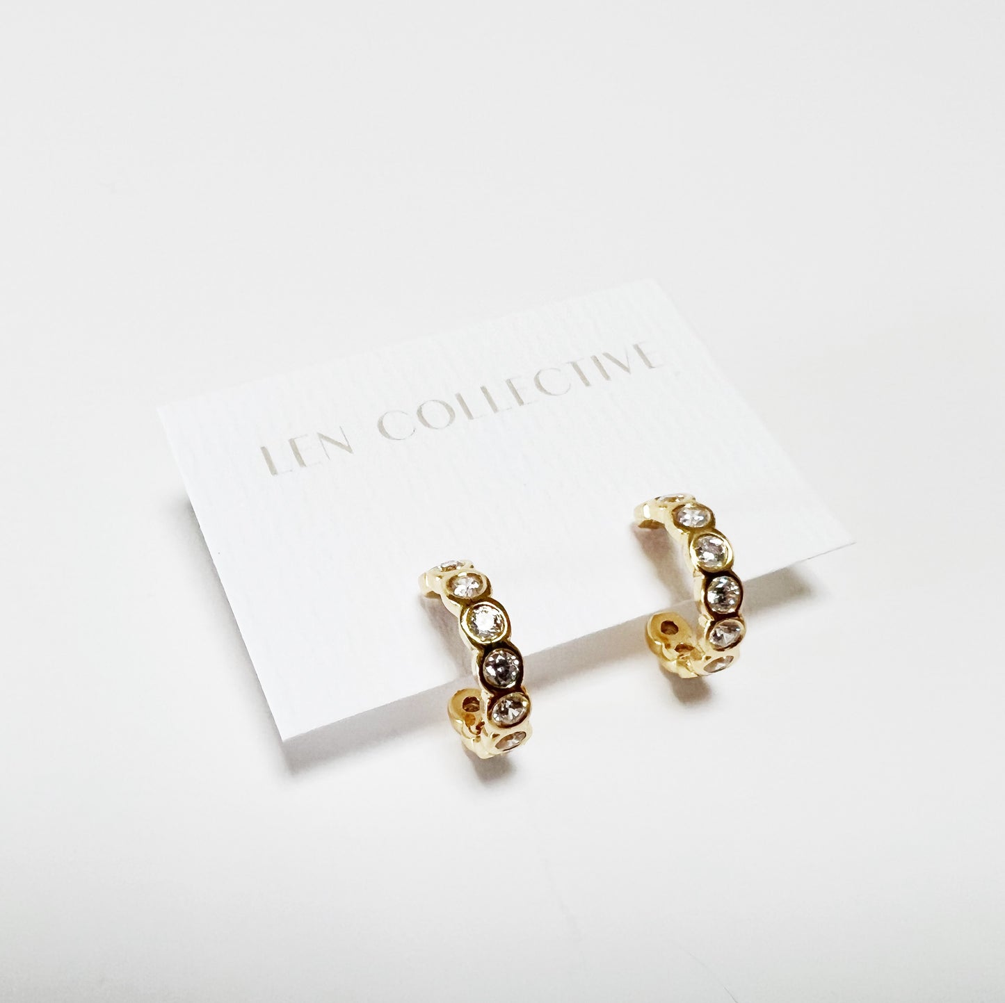 continuous bezel stone post hoop earrings - cz