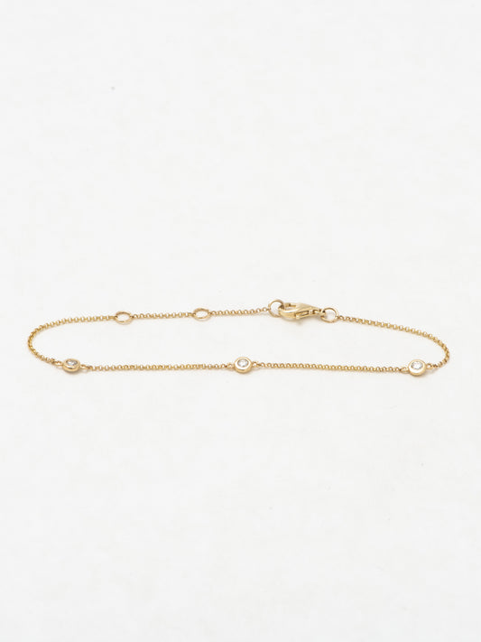 diamond bezel triple-stone bracelet