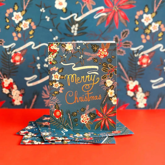 blue poinsettia christmas greeting card