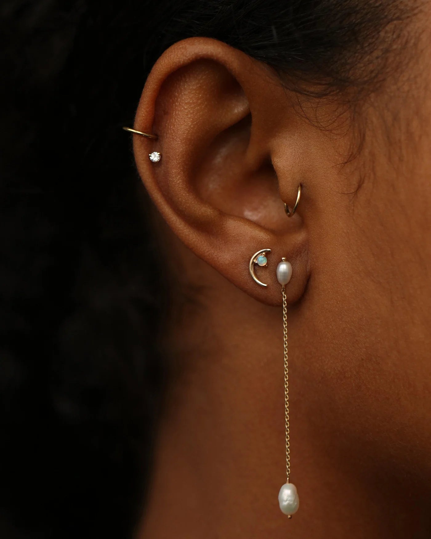 wwake / long pearl shower earring - single