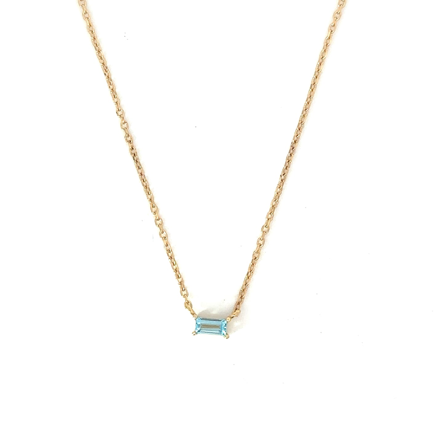 sky blue topaz baguette gold necklace
