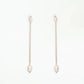 wwake / long pearl shower earring - single