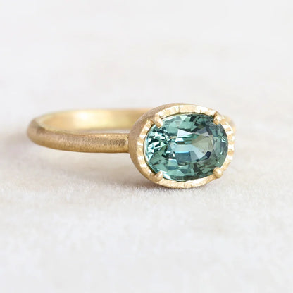 textured halo solitaire ring - green sapphire