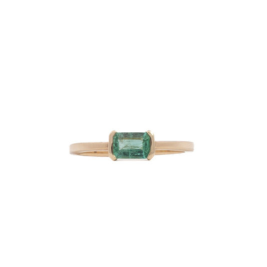 open bezel solitaire ring - natural emerald