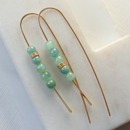 long curving earrings - moss aquamarine