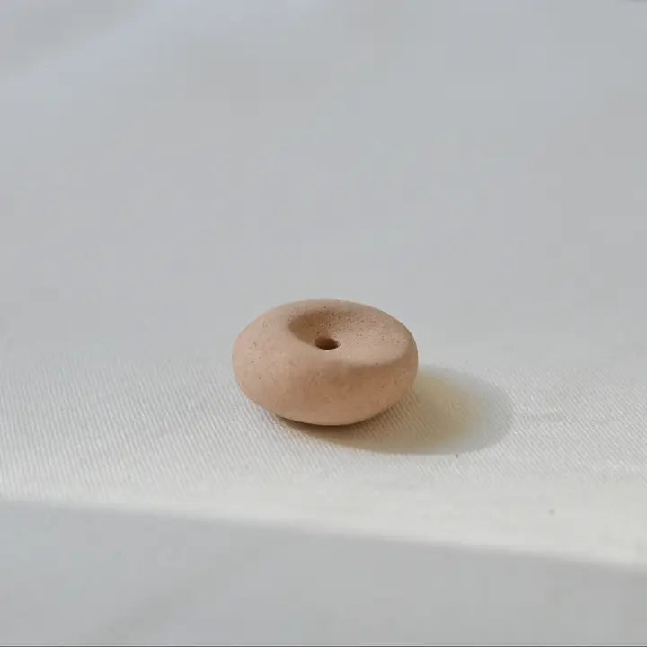 beige clay pebble incense holder