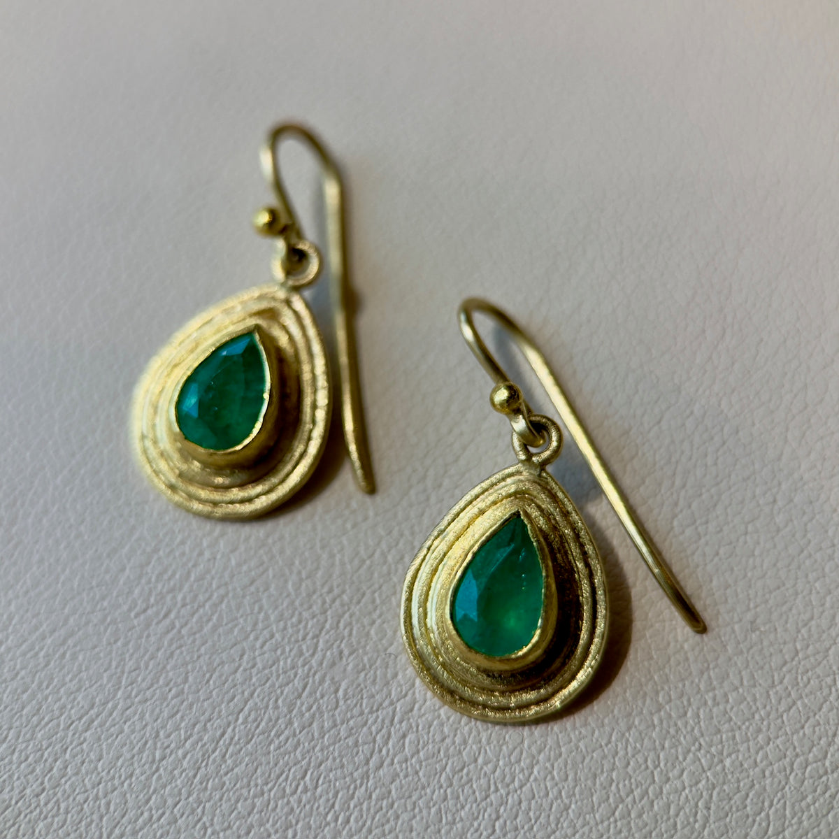 faceted emerald teardrop double framed dangle earrings