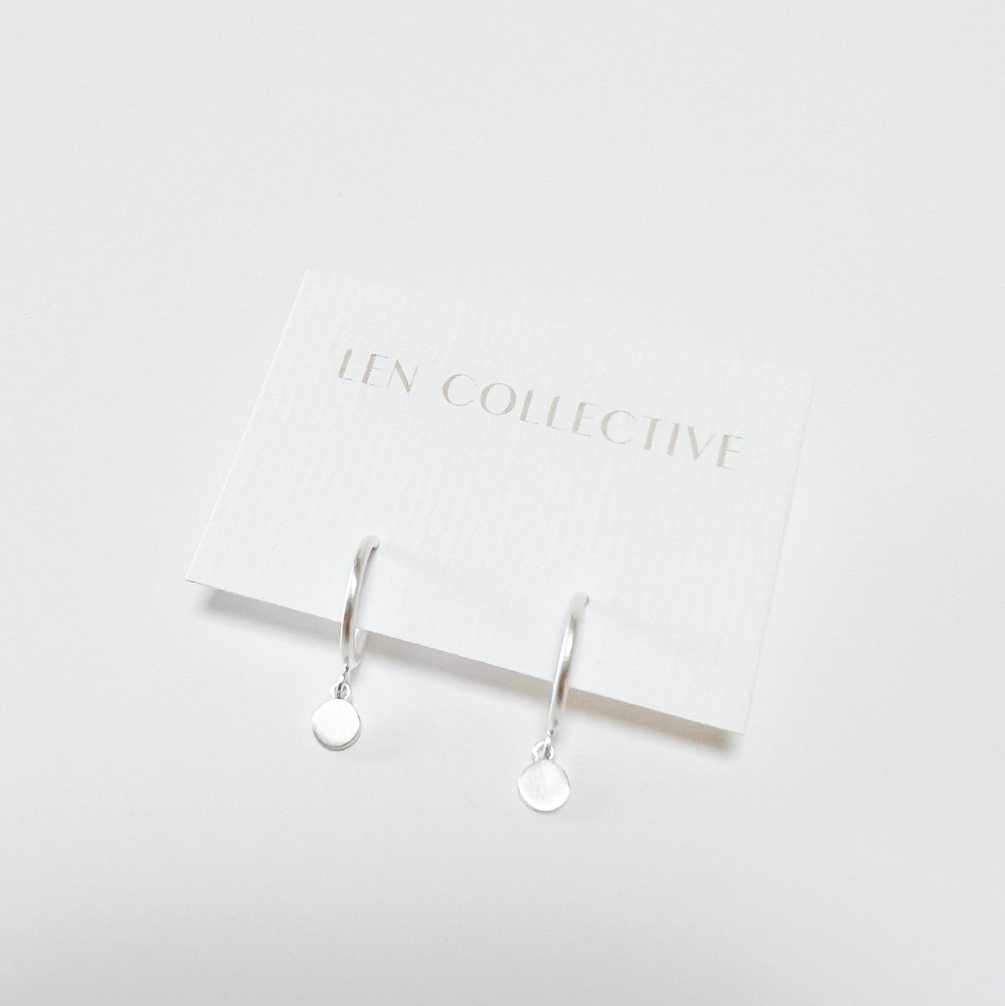 dangling disc post hoop earrings