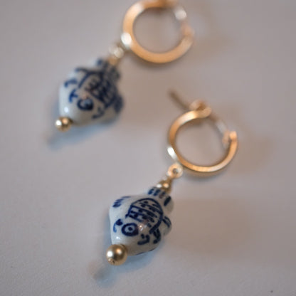 shannon len / ceramic fish tiny tube hoop earrings