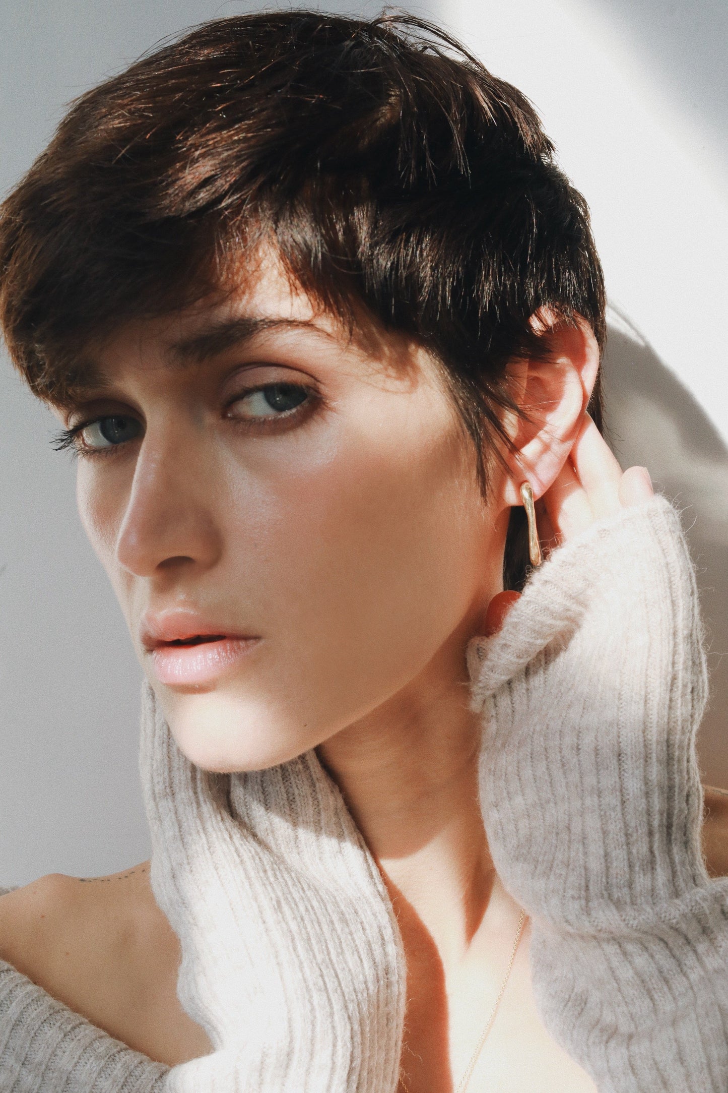 osso hoop earrings