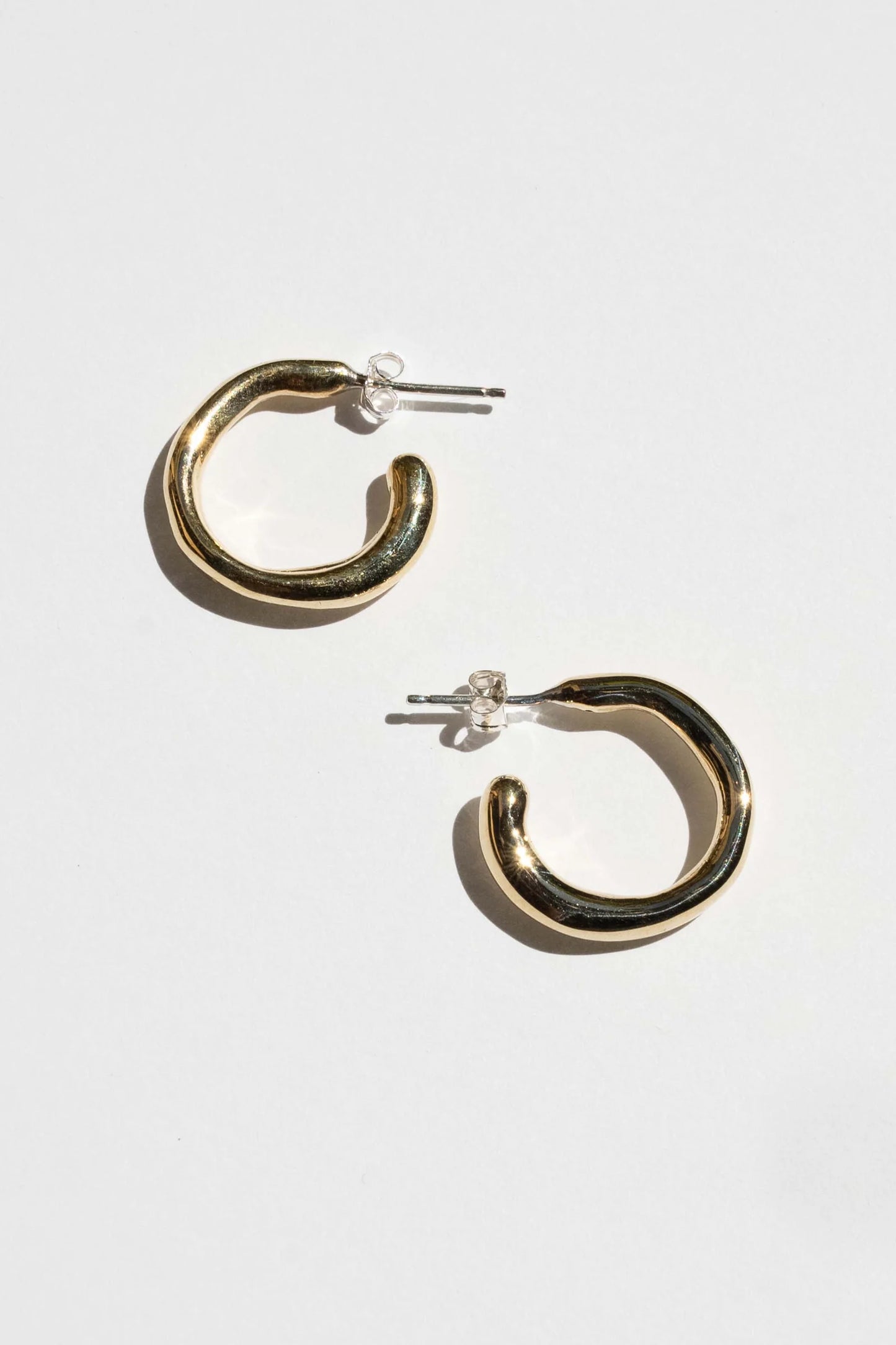 large fluid hoop earrings