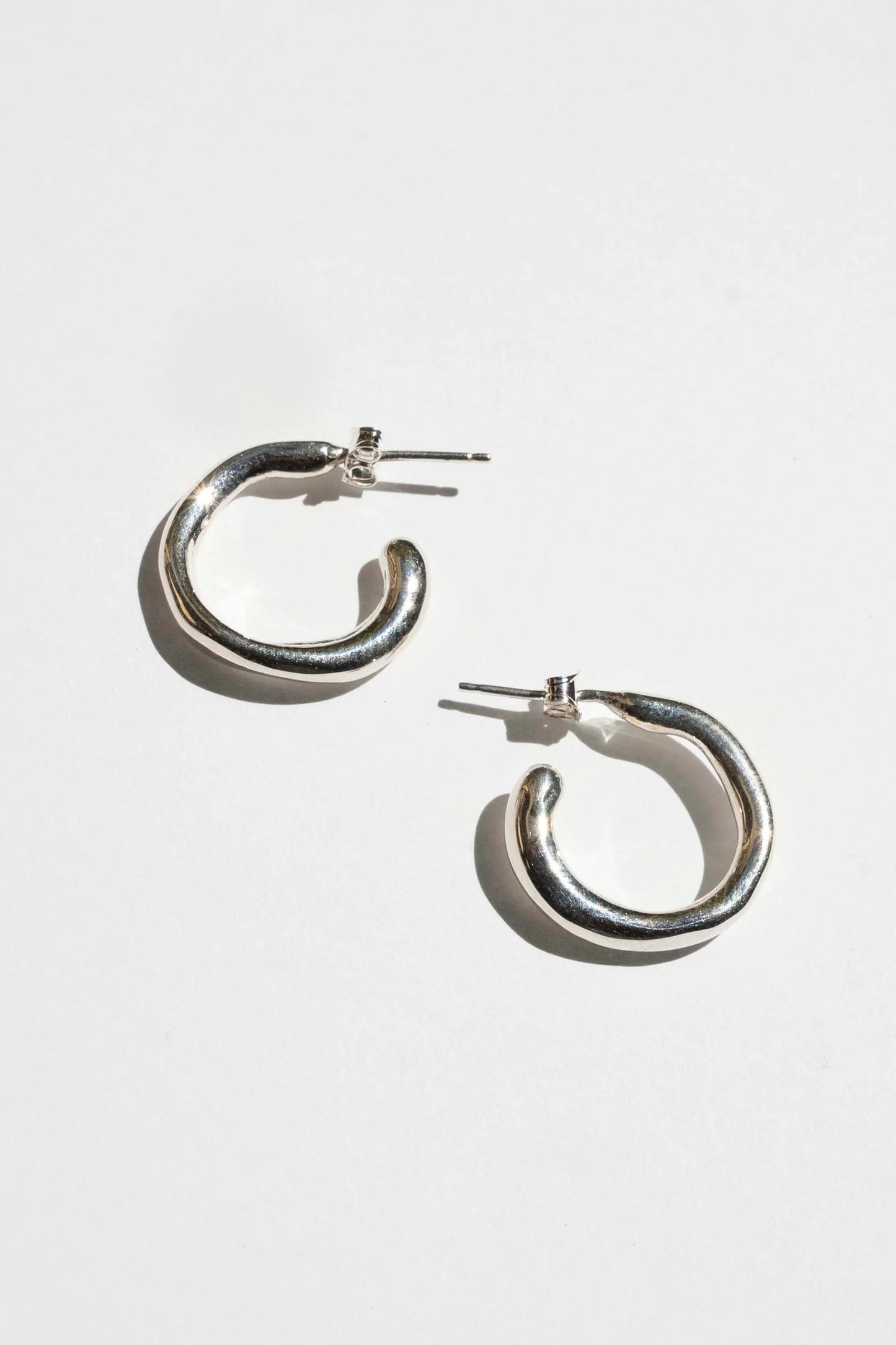 large fluid hoop earrings