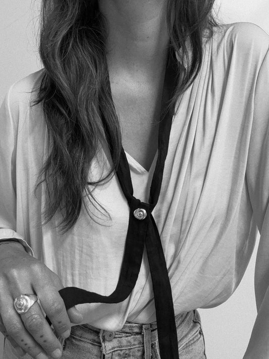 small compass brooch