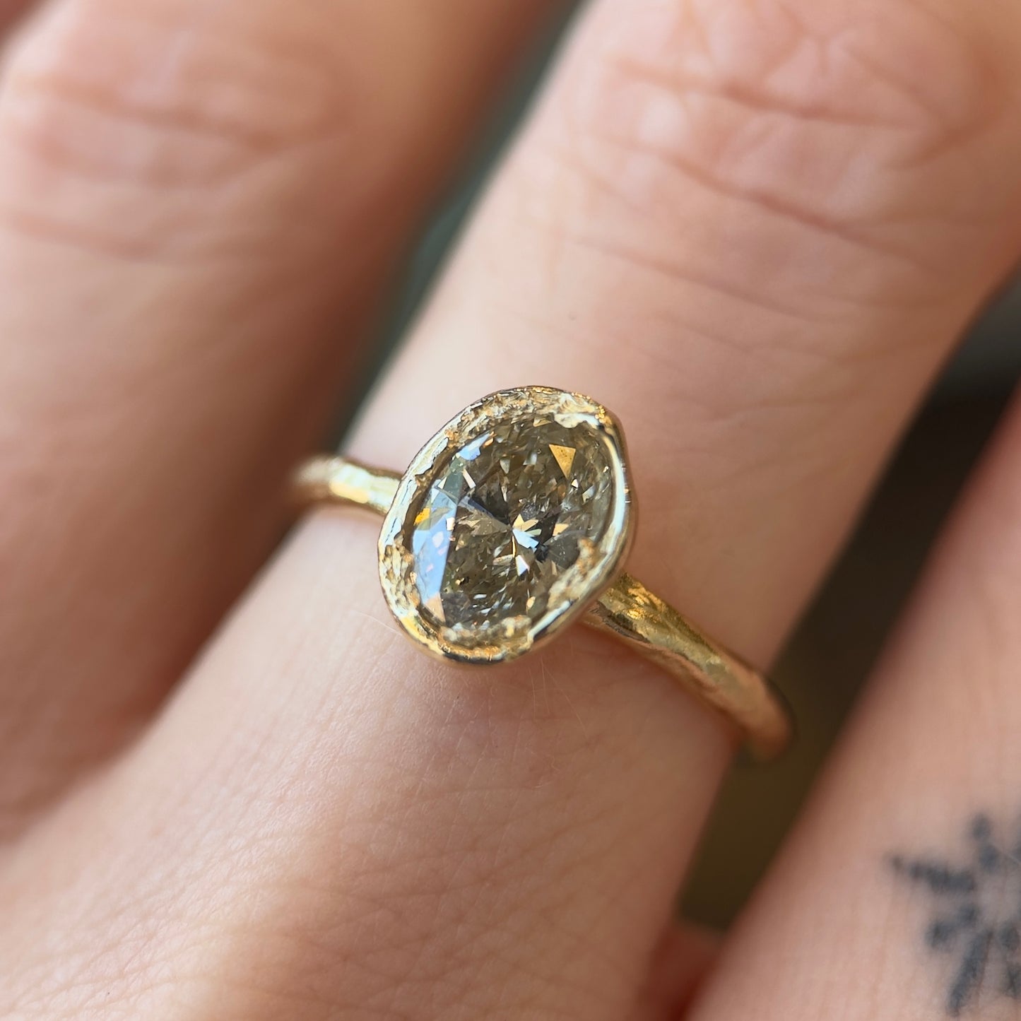 oval organic solitaire ring - natural light champagne diamond