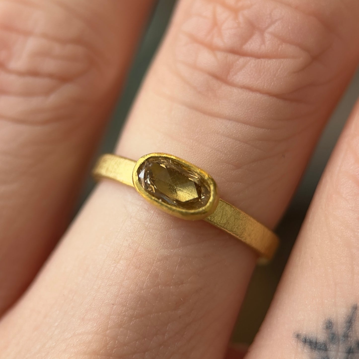 faceted oval champagne diamond ring