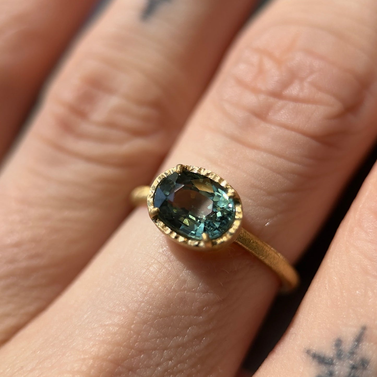textured halo solitaire ring - green sapphire