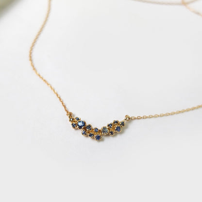 curved cluster necklace - blue sapphire