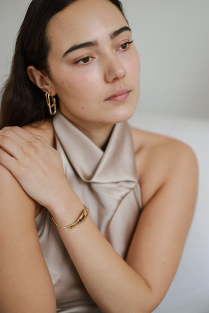 osso grande hoop earrings