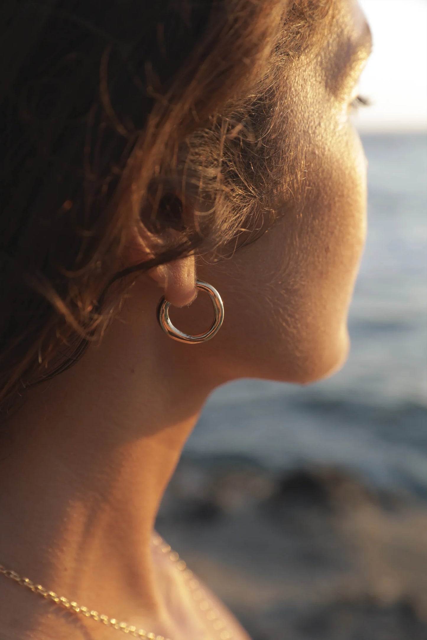 large fluid hoop earrings