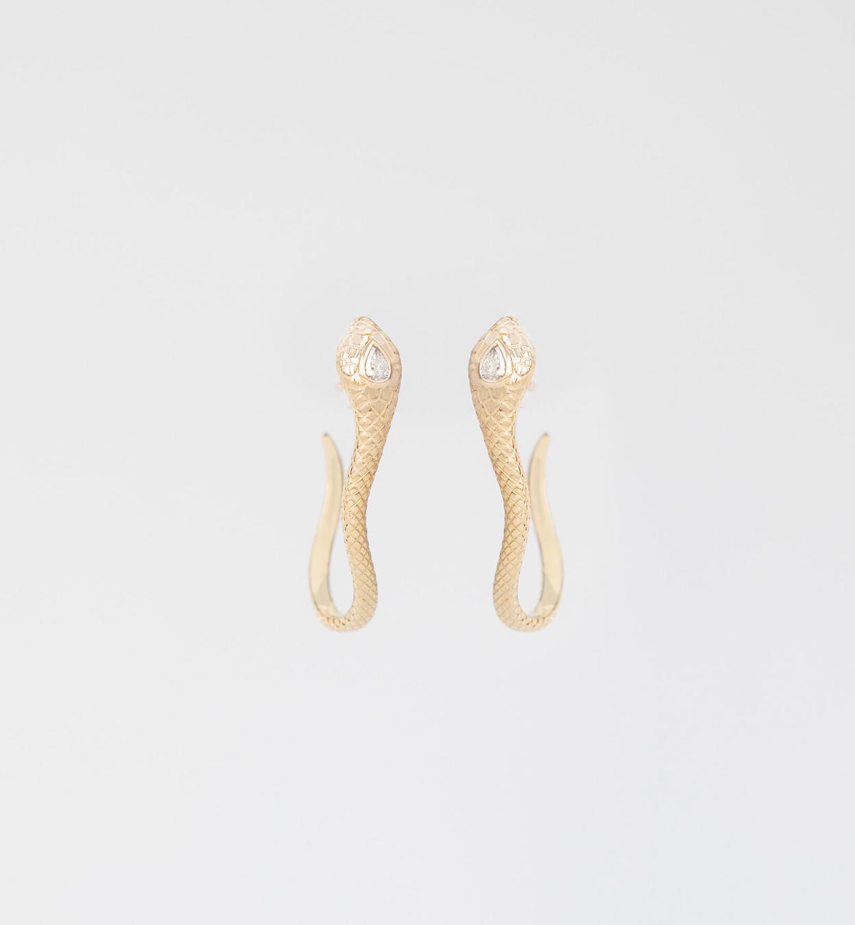 cobra pear diamond earrings